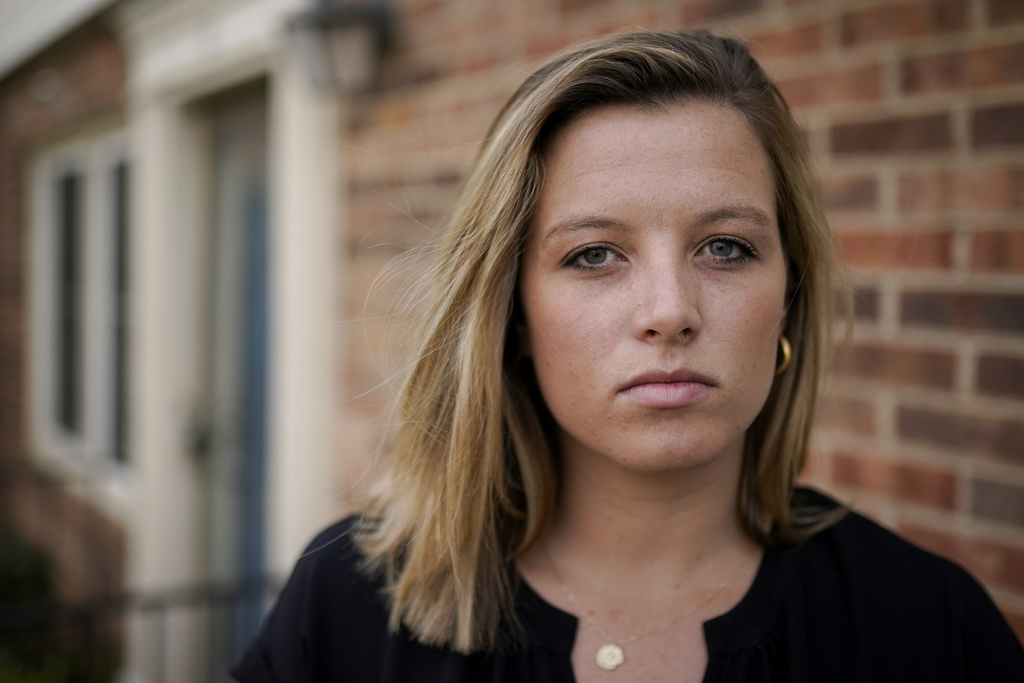 FILE - Shannon Keeler poses for a portrait in the United States, April 7, 2021. Two years after the former Gettysburg College student finally saw charges filed over her 2013 campus sexual assault, the man suspected of sending her a Facebook messages that said, “So I raped you,” — Ian Cleary — remains on the run in 2023.