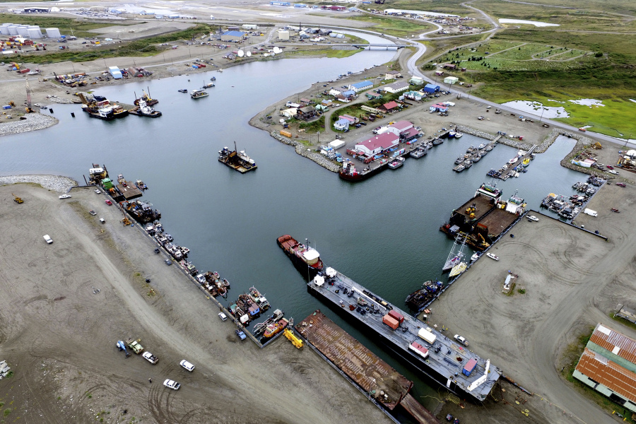 This photo provided by the City of Nome shows the inner harbor of the Port of Nome, Alaska, on Aug. 11, 2017, where goods at that arrive at the port are then prepared for shipment to villages throughout the region. Shipping lanes that were once clogged with ice for much of the year along Alaska's western and northern coasts have relented thanks to global warming, and the nation's first deep water Arctic port should be operational in Nome by the end of the decade.