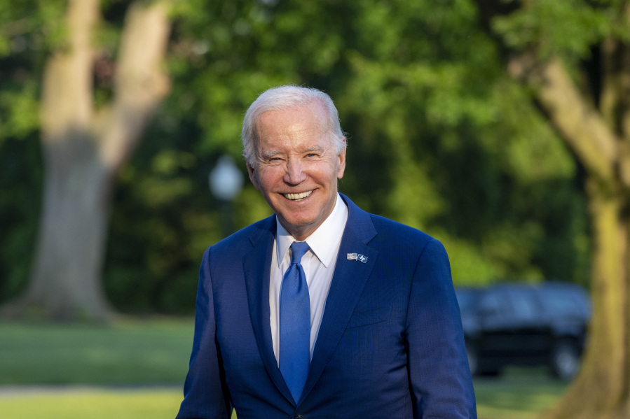 President Joe Biden smiles as he walks from Marine One upon arrival on the South Lawn of the White House, Thursday, June 1, 2023, in Washington. Biden is returning from Colorado.