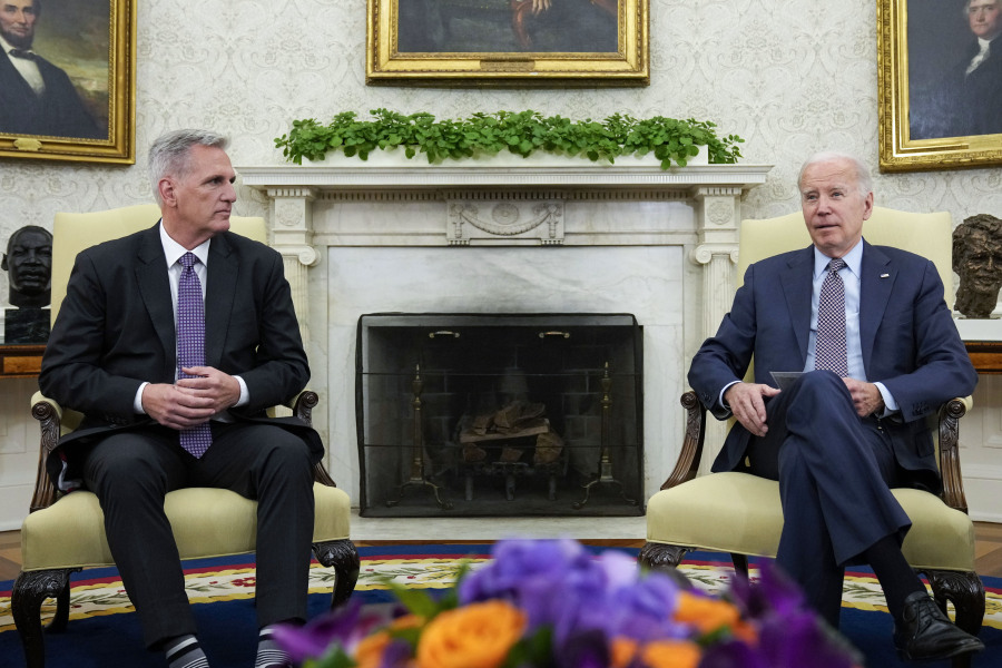 FILE - President Joe Biden meets with House Speaker Kevin McCarthy of Calif., to discuss the debt limit in the Oval Office of the White House, May 22, 2023, in Washington. Biden kept his eye on the long game when negotiating a deal with House Republicans to avert a U.S. government default.