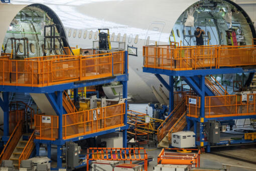 Boeing employees assemble 787s inside their main assembly building on their campus in North Charleston, S.C., on Tuesday, May 30, 2023.