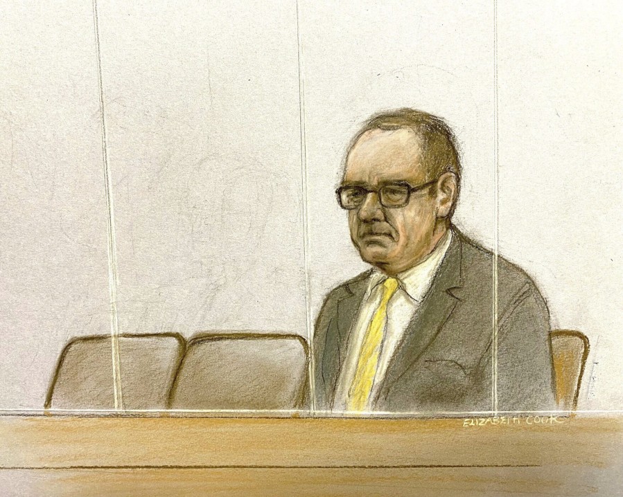 Court artist sketch by Elizabeth Cook of actor Kevin Spacey in the dock at Southwark Crown Court, London, Friday, June 30, 2023. Spacey is going on trial on charges he sexually assaulted four men as long as two decades ago. The double-Oscar winner faces a dozen charges at Southwark Crown Court. Spacey pleads not guilty to all charges.