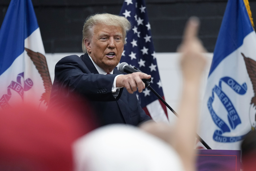 Former President Donald Trump visits with campaign volunteers at the Grimes Community Complex Park, Thursday, June 1, 2023, in Des Moines, Iowa.