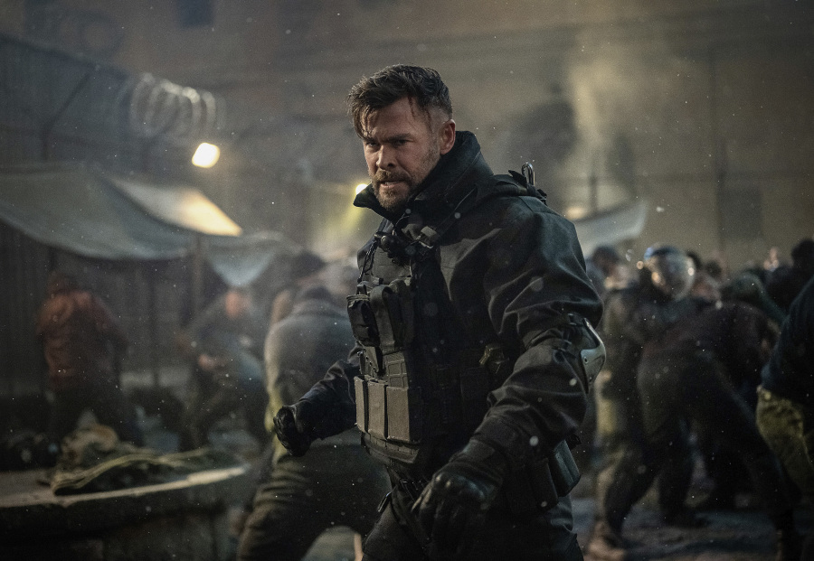 This image released by Netflix shows Chris Hemsworth in a scene from "Extraction 2." (Jasin Boland/Netflix via AP)