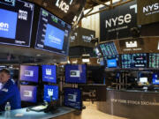 Traders work on the floor at the New York Stock Exchange in New York, Friday, June 2, 2023.