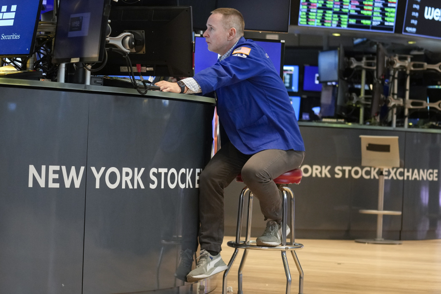 Traders work on the floor at the New York Stock Exchange in New York, Friday, June 2, 2023.