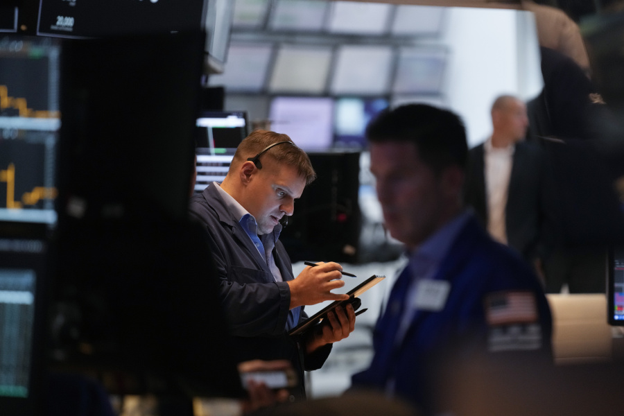 Traders work on the floor at the New York Stock Exchange in New York, Thursday, May 25, 2023.