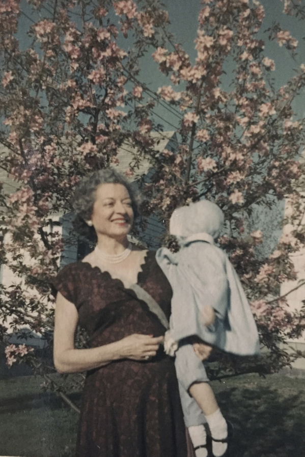 This undated photo provided by Nevada State Police shows Florence Charleston, left, holding her niece. In 1978, a garment bag containing a woman's heavily decayed remains was discovered in a remote area of northern Nevada. On Wednesday, June 14, 2023, Nevada State Police announced that advancements in DNA testing led recently to an identification: Florence Charleston, a Cleveland woman who had moved to Portland, Ore., shortly before her death.