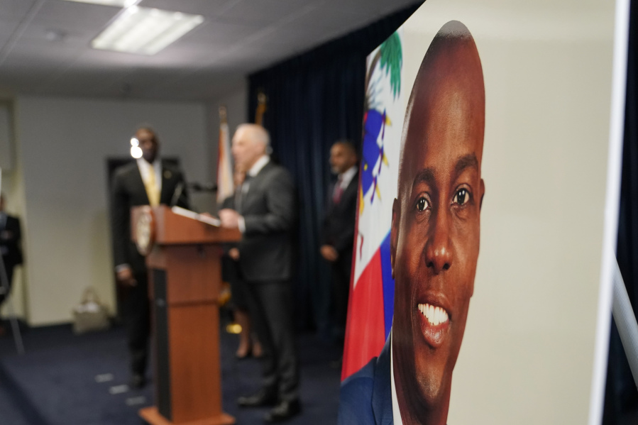 FILE - An image of Haitian President Jovenel Mo?se is displayed at a news conference, Feb. 14, 2023, in Miami. Rodolphe Jaar, a dual Haitian-Chilean businessman who helped former Colombian soldiers obtain weapons to assassinate Mo?se in 2021 was sentenced on June 2, 2023 to life in prison in the U.S., nearly two months after admitting his involvement in the assassination.