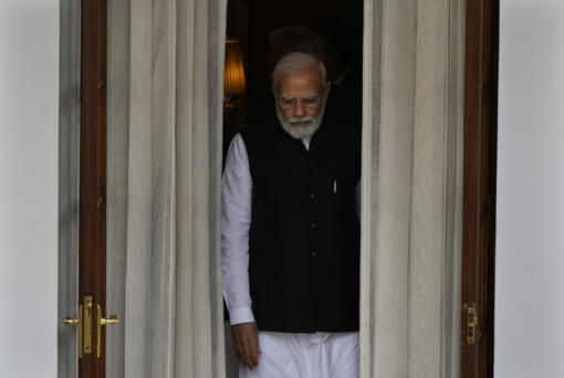 Indian Prime Minister Narendra Modi leaves to receive Nepal's Prime Minister Pushpa Kamal Dahal before their meeting in New Delhi, India, Thursday, June 1, 2023. Dahal arrived Wednesday on a state visit, his first trip abroad since taking power in December last year.