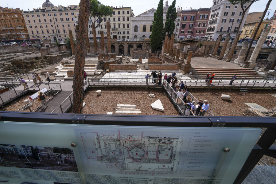 Journalists visit the new walkways of the so called "Sacred Area" where four temples, dating back as far as the 3rd century B.C., stand smack in the middle of one of modern Rome's busiest crossroads Monday.