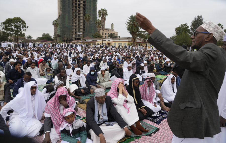 Imam delivers sermon as Muslims gather for prayers to celebrate Eid al-Adha, or Feast of Sacrifice, that commemorates the Prophet Ibrahim's faith, in Nairobi, Kenya, Wednesday, June 28, 2023. Eid al-Adha marks the end of hajj.