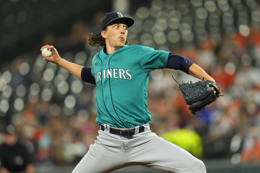 Seattle Mariners starting pitcher Logan Gilbert throws a pitch to the Baltimore Orioles during the second inning of a baseball game, Friday, June 23, 2023, in Baltimore.