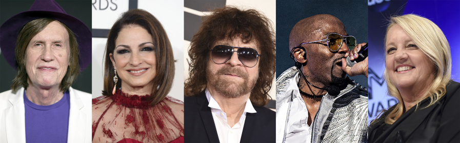 This combination of photos shows, from left. Glen Ballard, Gloria Estefan, Jeff Lynne, Teddy Riley and Liz Rose, who will be inducted into the Songwriters Hall of Fame on Thursday.