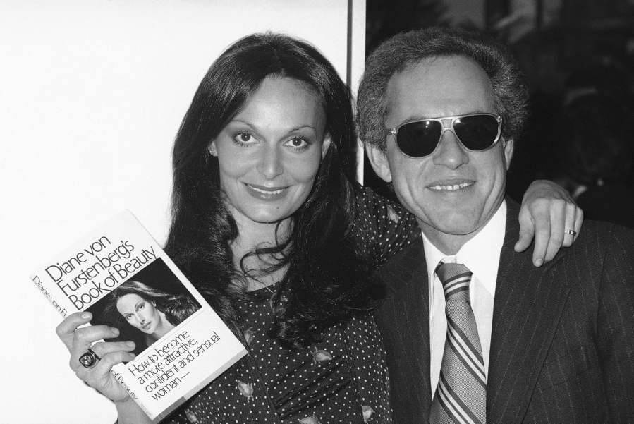 Diane von Furstenberg poses with Simon & Schuster executive Richard Snyder on Feb. 28, 1977, celebrating the publication of her new book on beauty. Snyder, a visionary and imperious executive at Simon & Schuster who presided over the publisher's exponential rise over the past half century and helped define an era of growing corporate power, died on Tuesday at his home in Los Angeles at age 90.