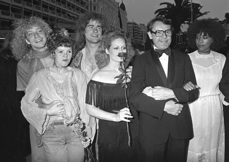 FILE - U.S. actors, from left, Don Dacus, Annie Golden, Treat Williams, Beverly d'Angelo, director Milos Forman, and Cheryl Barnes arrive for the presentation of "Hair" during the 32nd Cannes Film Festival in Cannes, France May 10, 1979. Williams, whose nearly 50-year career included starring roles in the TV series "Everwood" and the movie "Hair," died Monday, June 12, 2023, after a motorcycle crash in Vermont, state police said. He was 71.