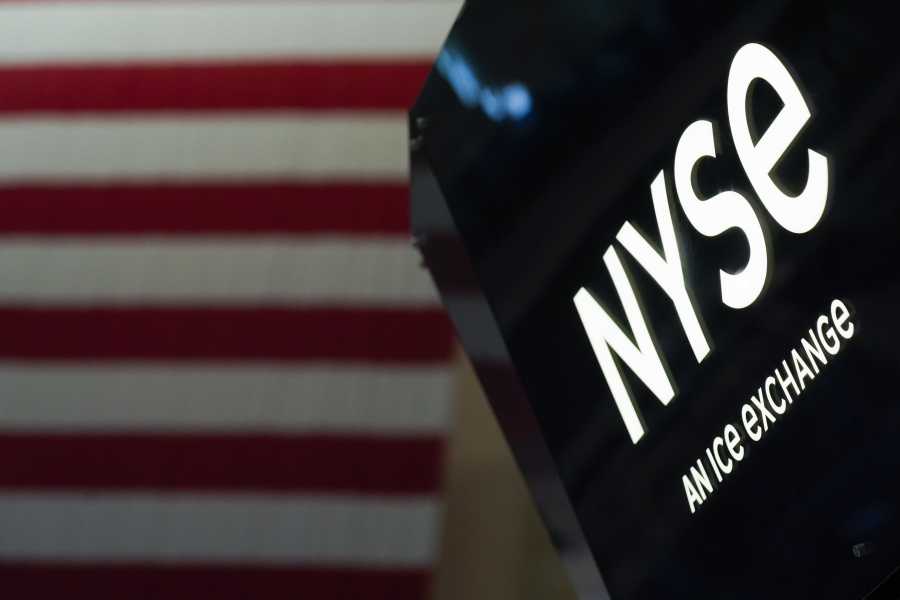 FILE - A NYSE sign is seen on the floor at the New York Stock Exchange in New York, Wednesday, June 15, 2022. Wall Street's performance in the second half of 2023 will likely depend on whether the economy falls into a recession.