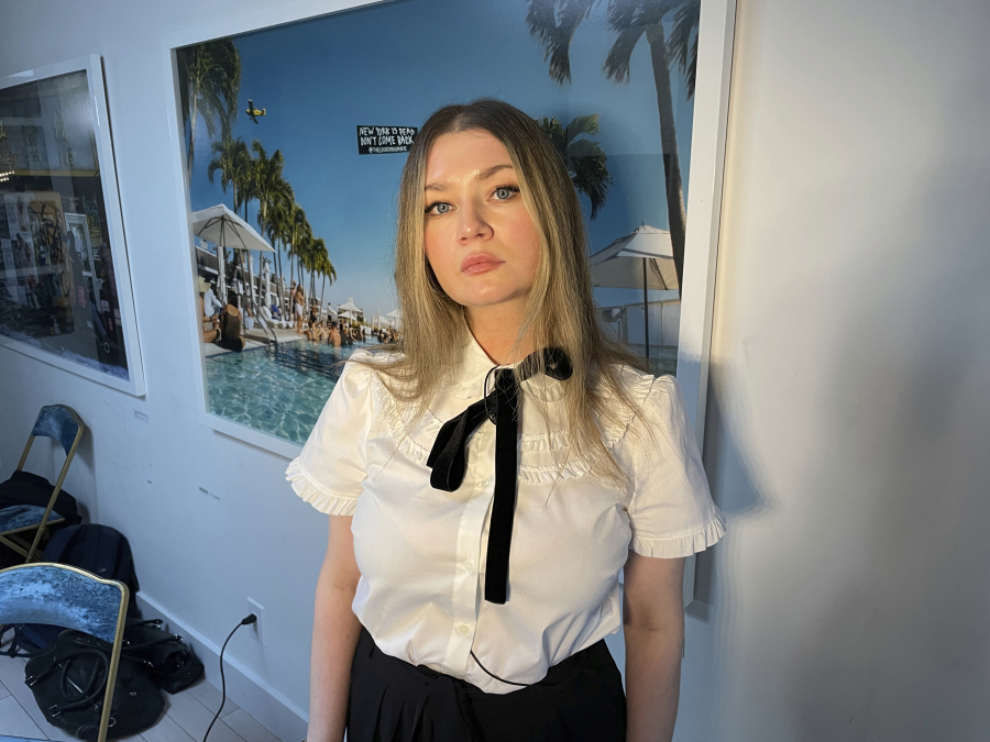 Anna Delvey, also known as Anna Sorokin, poses at her apartment in New York on May 26, 2023, to promote her podcast, "The Anna Delvey Show." (AP Photo/John Carucci)