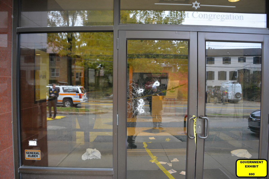 This photo of bullet damaged doors in the Tree of Life synagogue building in Pittsburgh was entered June 1, 2023, as a court exhibit by prosecutors in the federal trial of Robert Bowers. He faces multiple charges in the killing of 11 worshippers from three congregations and the wounding of seven worshippers and police officers in the building on Oct. 27, 2018. The charges include the obstruction of the free exercise of religion, resulting in death. (U.S.
