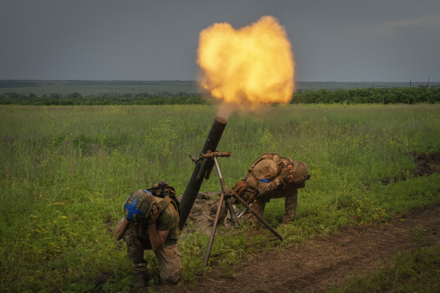 Ukrainian soldiers fire toward Russian position on the frontline in Zaporizhzhia region, Ukraine, Saturday, June 24, 2023.