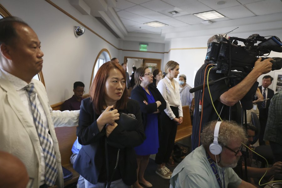 Members of the Korean-American community attend Cordell Goosby's arraignment, Thursday, June 29, 2023, in Seattle. Goosby who fatally shot a pregnant woman in Seattle earlier this month while exhibiting signs of a mental health crisis has pleaded not guilty to murder charges.