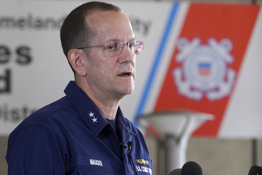 U.S. Coast Guard Rear Adm. John Mauger, commander of the First Coast Guard District, talks to the media, Monday, June 19, 2023, in Boston. A search is underway for a missing submersible that carries people to view the wreckage of the Titanic. Canadian officials say the five-person submersible was reported overdue Sunday night about 435 miles (700 kilometers) south of St. John's, Newfoundland and that the search is being led by the U.S. Coast Guard.