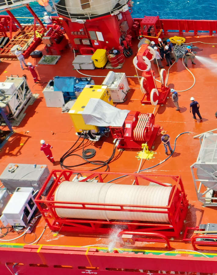 Components of a Flyaway Deep Ocean Salvage System, or FADOSS, rest on the deck of a vessel in this undated photo provided by the U.S. Navy Office of Information. The U.S. Navy said Sunday, June 25, 2023, that it won't be using a Flyaway Deep Ocean Salvage System it had deployed to the effort to retrieve the Titan submersible. The Navy would only use the system if there were pieces large enough to require the specialized equipment. The submersible imploded on its way to tour the Titanic wreckage, killing all five on board. (U.S.