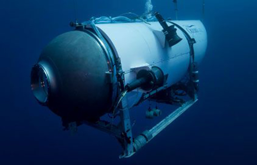 FILE - This undated image provided by OceanGate Expeditions in June 2021 shows the company's Titan submersible. The wrecks of the Titanic and the Titan sit on the ocean floor, separated by 1,600 feet (490 meters) and 111 years of history. How they came together unfolded over an intense week that raised temporary hopes and left lingering questions.