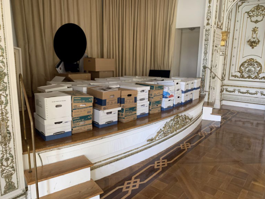 This image, contained in the indictment against former President Donald Trump, shows boxes of records being stored on the stage in the White and Gold Ballroom at Trump's Mar-a-Lago estate in Palm Beach, Fla. Trump is facing 37 felony charges related to the mishandling of classified documents according to an indictment unsealed Friday, June 9, 2023.