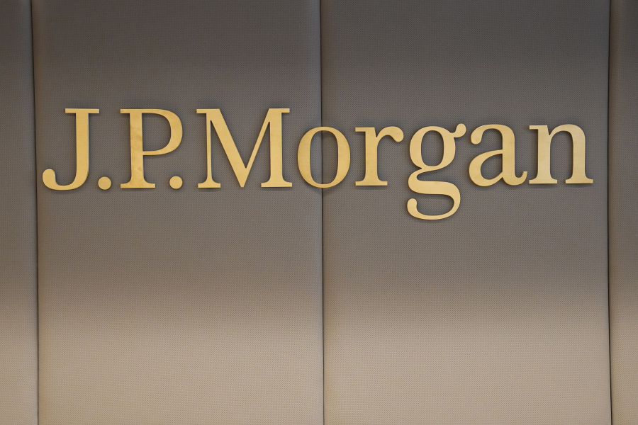 FILE - The logo of JPMorgan bank is pictured at the new French headquarters of JP Morgan bank, Tuesday, June 29, 2021, in Paris. JPMorgan Chase is defending itself against a lawsuit by the U.S. Virgin Islands accusing it of empowering Jeffrey Epstein to abuse teenage girls. Lawyers for the giant bank said in court papers Tuesday, May 23, 2023, that it was the islands that enabled the financier to commit his crimes.