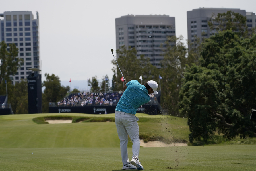 Brooks Koepka hits from the fairway on the 14th hole during a practice round for the U.S. Open Championship golf tournament at The Los Angeles Country Club on Tuesday, June 13, 2023, in Los Angeles.