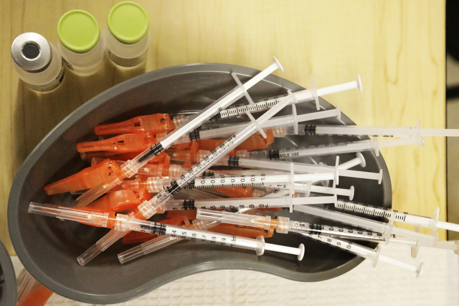 FILE - Pre-loaded syringes with COVID-19 vaccine are ready for use in New Orleans, on Jan. 25, 2022. The COVID-19 vaccines are on track for a big recipe change this fall.  Scientific advisers for the Food and Drug Administration on Thursday, June 15, 2023, discussed whether the next round of shots should only include protection against the newest omicron strains that are now dominant worldwide.