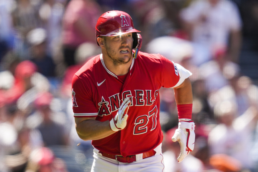 Los Angeles Angels' Mike Trout (27) runs on a single during the seventh inning of a baseball game against the Chicago White Sox in Anaheim, Calif., Thursday, June 29, 2023.