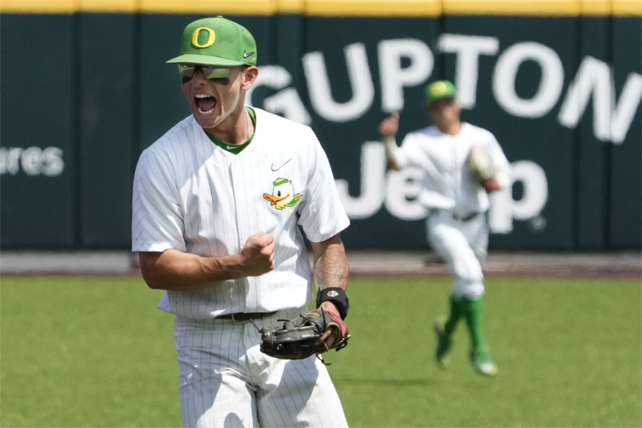 Oregon second baseman Gavin Grant celebrates after completing a double play in the ninth inning to end Oregon's 5-4 win over Xavier during an NCAA regional college tournament baseball game on Friday June 2, 2023, in Nashville, Tenn.