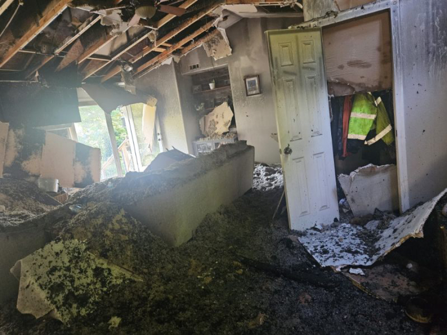 The burned interior of a house that caught fire early Wednesday morning in the 22000 block of Northeast WH Garner Road near Yacolt. The fire was one of six fireworks-related fires the Clark County Fire Marshal's Office investigated Tuesday and the early morning hours Wednesday.