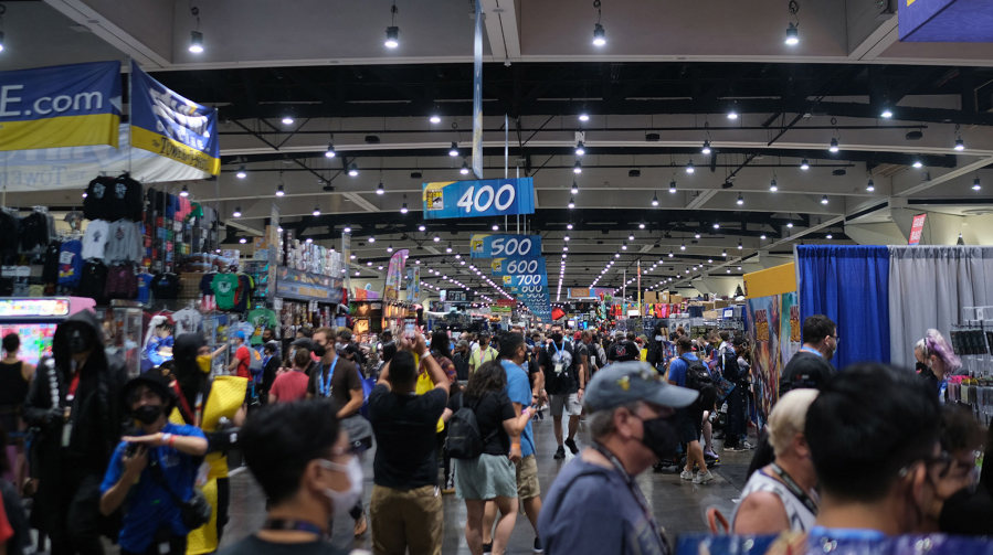 Attendees walk through the Exhibit Hall during San Diego Comic-Con International in San Diego, California, on July 24, 2022.