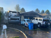A residential fire caused damage to a home, vehicle and motorhome on Friday in Salmon Creek.