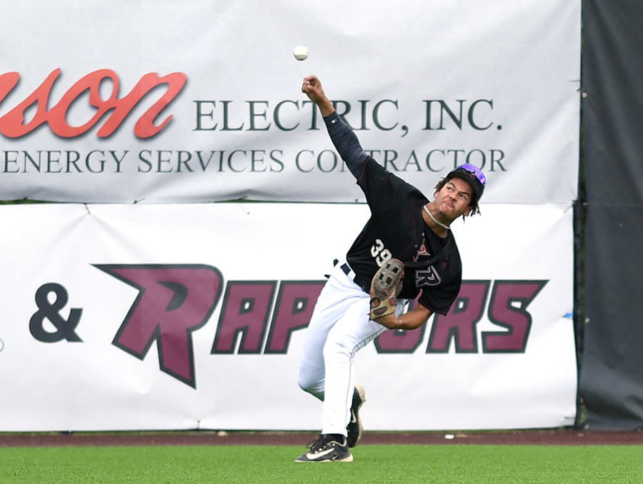 Raptors outfielder Quincy Scott throws the ball Friday, June 16, 2023, during the Raptors? game against Cowlitz at the Ridgefield Outdoor Recreation Complex.