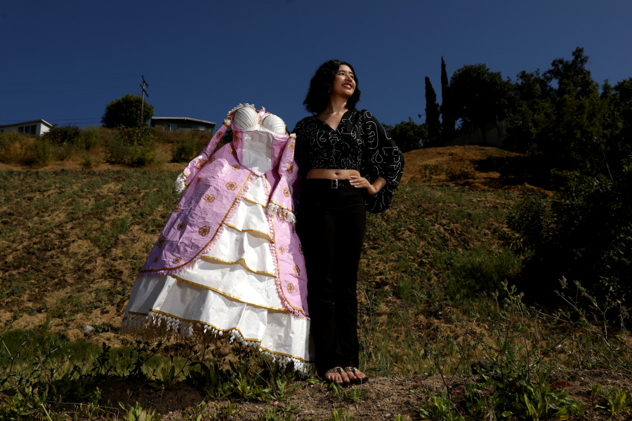 Karla Torres, a recent graduate of Francisco Bravo Medical Magnet High School in Boyle Heights, designed and created the 18th century-inspired prom dress out of duct tape for the "Stuck at Prom" scholarship contest.