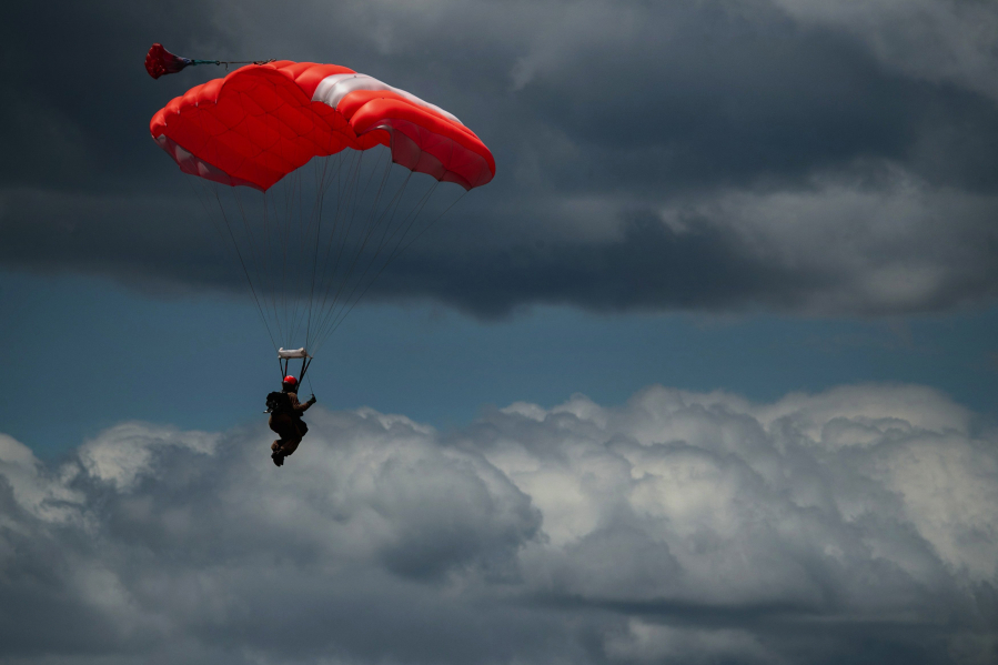 A smokejumper participates in a proficiency jump near The North Cascades Smokejumper Base in Winthrop, Washington. Rookie smokejumpers need to successfully complete at least 25 jumps in order to become a qualified smokejumper, says I??aki Baraibar, smokejumper training manager.