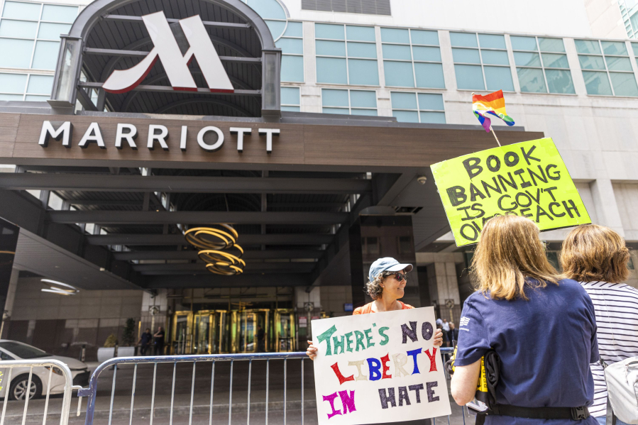 Protesters at the front of the Philadelphia Marriott Downtown hotel entrance during the visit by the group Moms for Liberty last week.