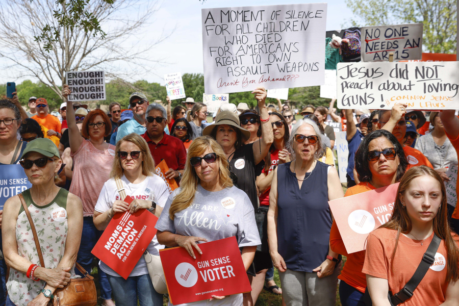People gather during a rally to support the Allen community and those impacted by gun violence on May 13, 2023, at Green Park in Allen.