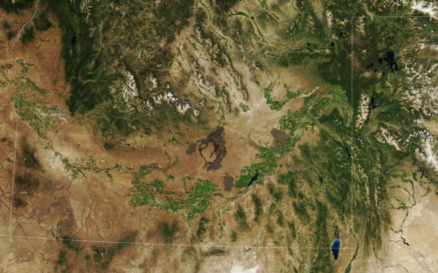 This satellite image of southern Idaho shows the Snake River Plain, where most of the state's potatoes are grown. NASA refers to this area as the "potato belt," a belt of low-lying land that extends across southern Idaho.
