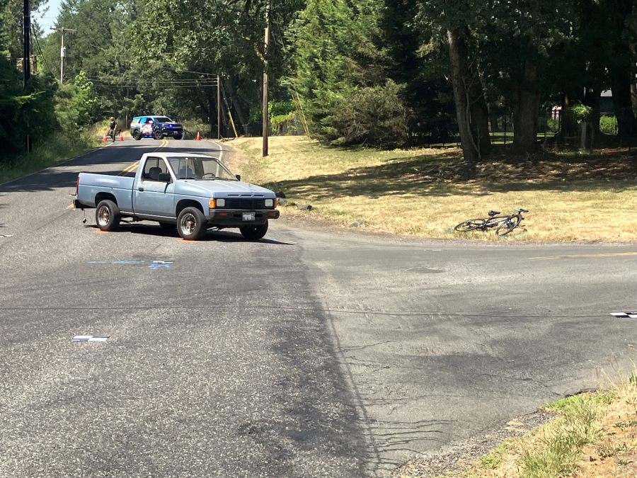 The scene of a Tuesday crash after Clark County sheriff's deputies say a pickup struck a bicyclist on Northwest 291st Street. The bicyclist was taken to an area hospital with serious injuries.