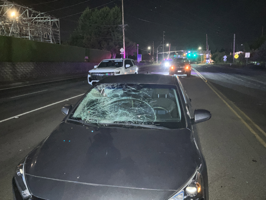 A car after it struck a pedestrian early Friday morning in the Walnut Grove area. The pedestrian was taken to PeaceHealth Southwest Medical Center with serious injuries.