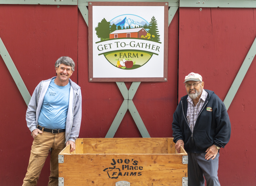 John Spencer, left, owner of Get To-Gather Farm in Washougal, receives mentorship from Joe Beaudoin, former owner of Joe's Place Farms in Vancouver.