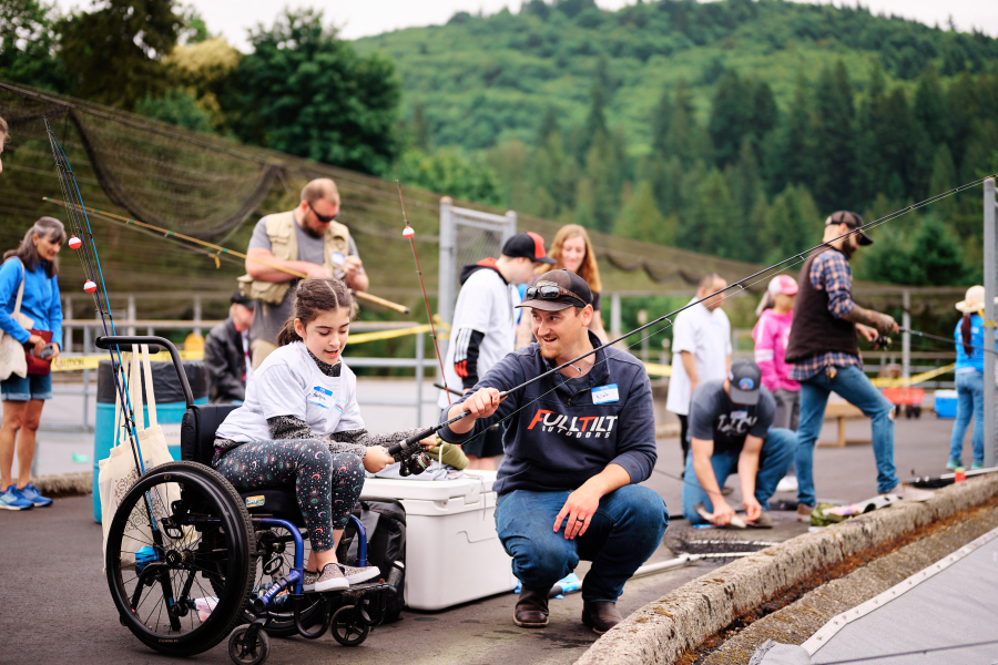 At the 23rd annual Merwin Special Kids Day, more than 200 kids took home as many as five fish each, aided by volunteers from Pacific Power, the Washington Department of Fish & Wildlife, and many recreational fishing organizations and corporate vendors.