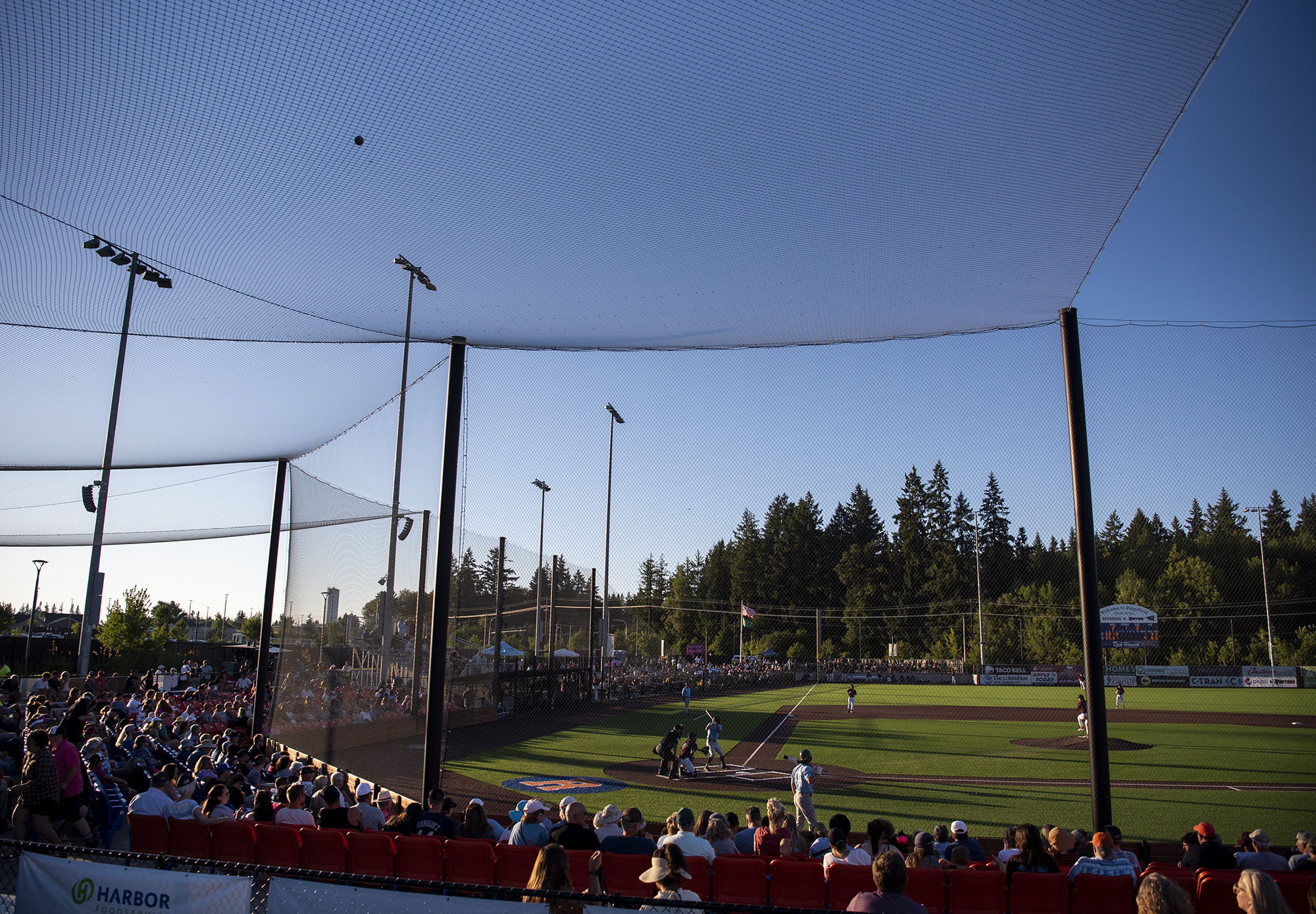 Fans watch a baseball game between the Ridgefield Raptors and the Yakima Valley Pippins on Friday, July 14, 2023, at the Ridgefield Outdoor Recreation Complex.