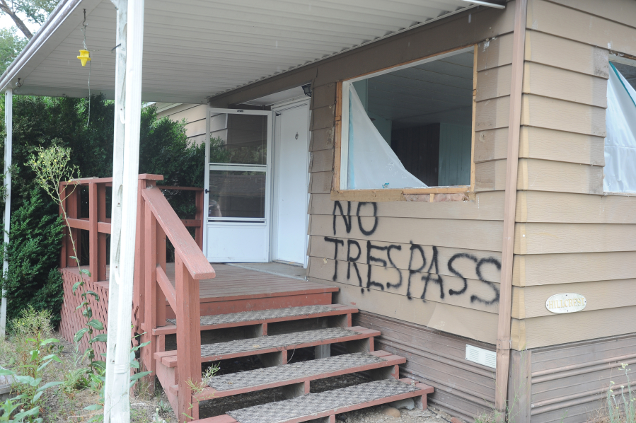 No trespassing signs warn visitors not to enter the old caretaker residence at Daybreak Regional Park. The home and an outbuilding are slated for demolition later in the week.