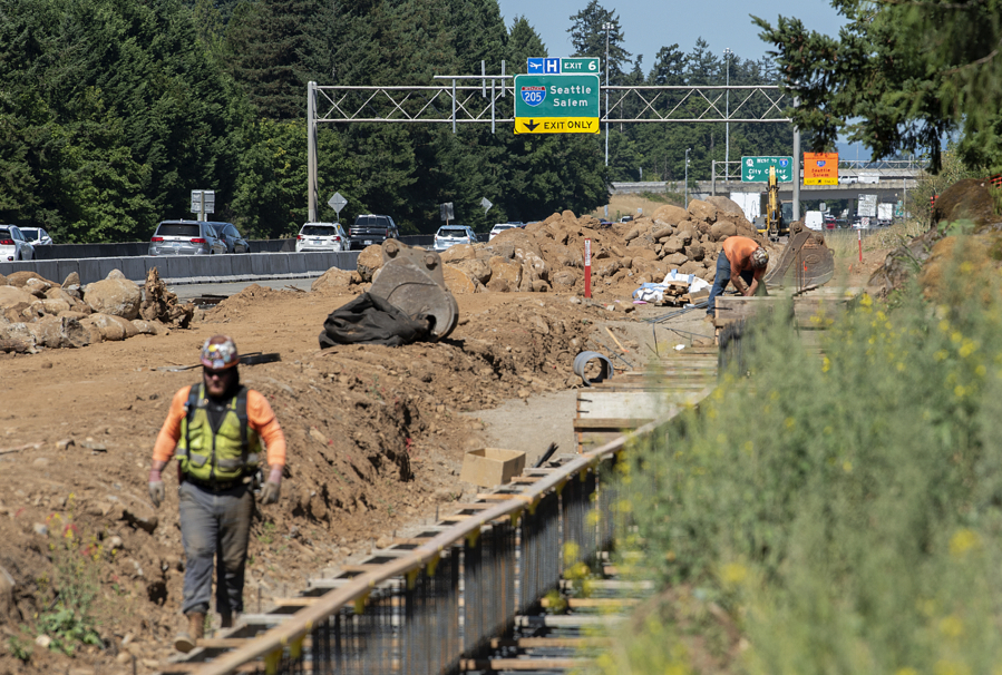 A project to widen state Highway 14 to three lanes in each direction between Interstate 205 and Southeast 164th Avenue is under construction with completion due next year.
